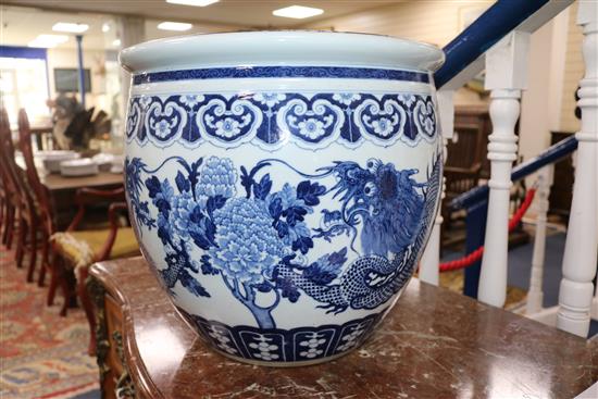 A large 19th century Chinese blue and white fish bowl height 37.5cm